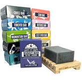 Eleven boxes of Savvy Fit Soaps, plant-based and USA-made, displayed together, showcasing a variety of natural and sustainable skincare products.